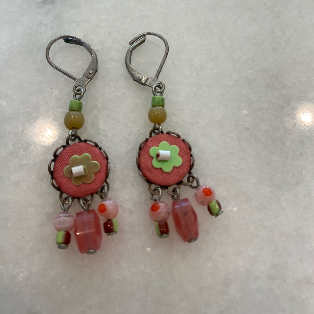 Dangling coral colored earrings